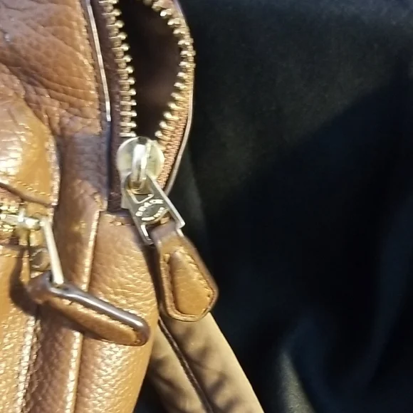 Coach Mini Charlie Brown Leather Backpack with Classic Silhouette